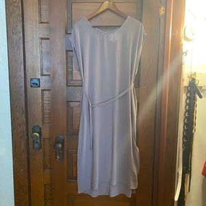 Over the tunic-tunic.